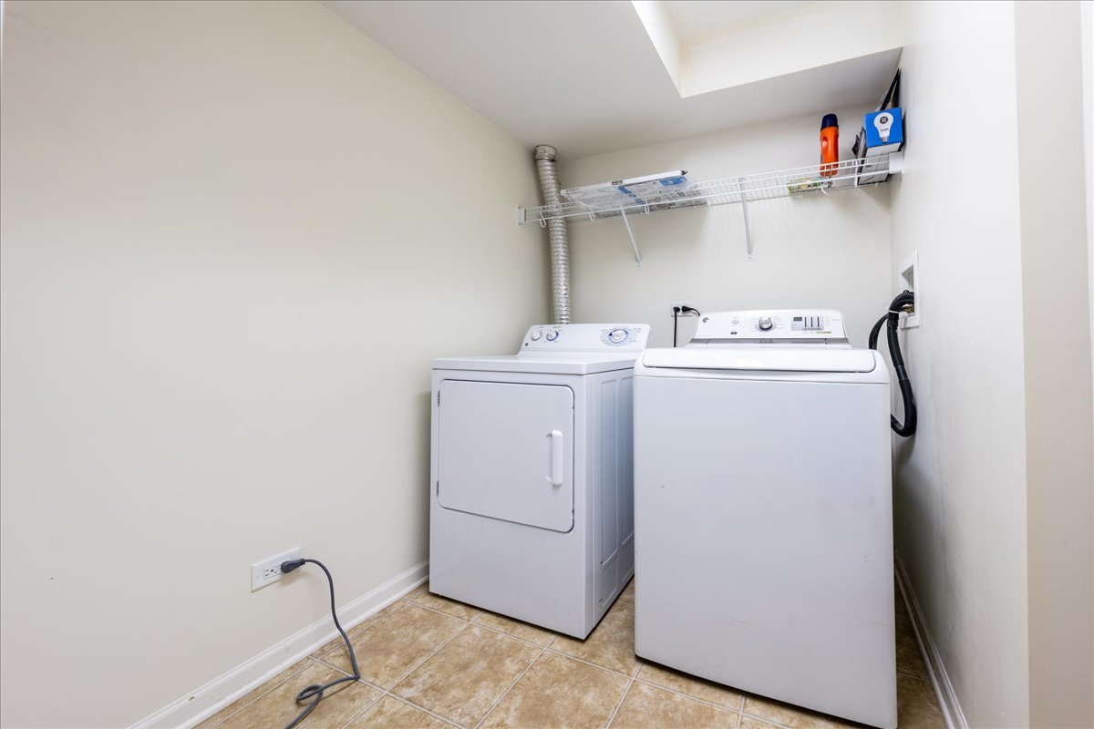 233 Jackson Street Gilberts, IL 60136 - Photo 24 of 29 a utility room with dryer and washer