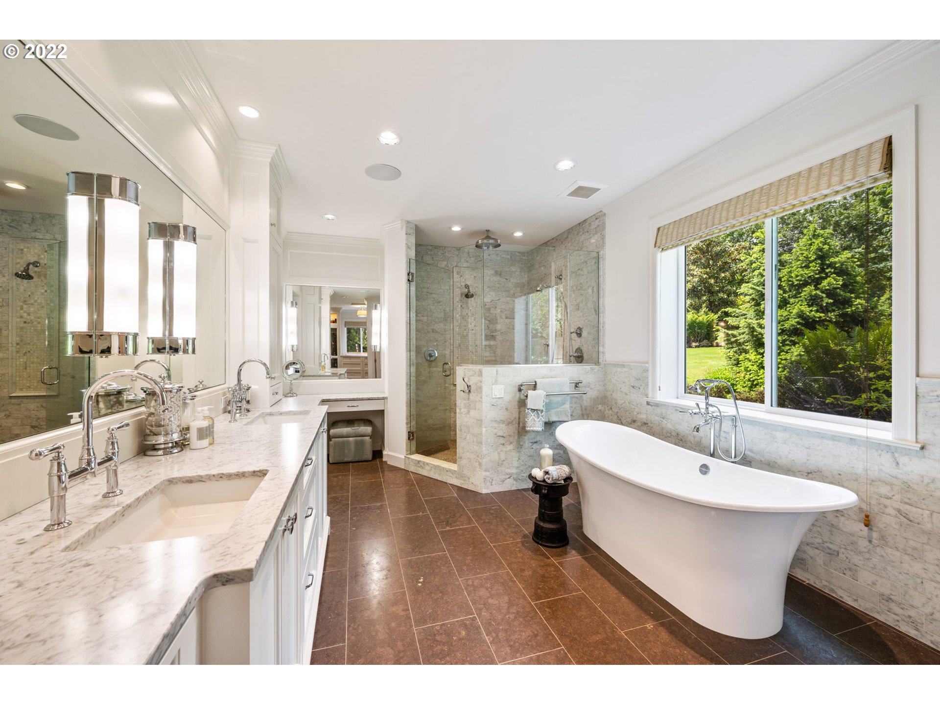 29195 Northeast Benjamin Road Newberg, OR 97132 - Photo 14 of 32 a spacious bathroom with a double vanity sink a mirror and a bathtub