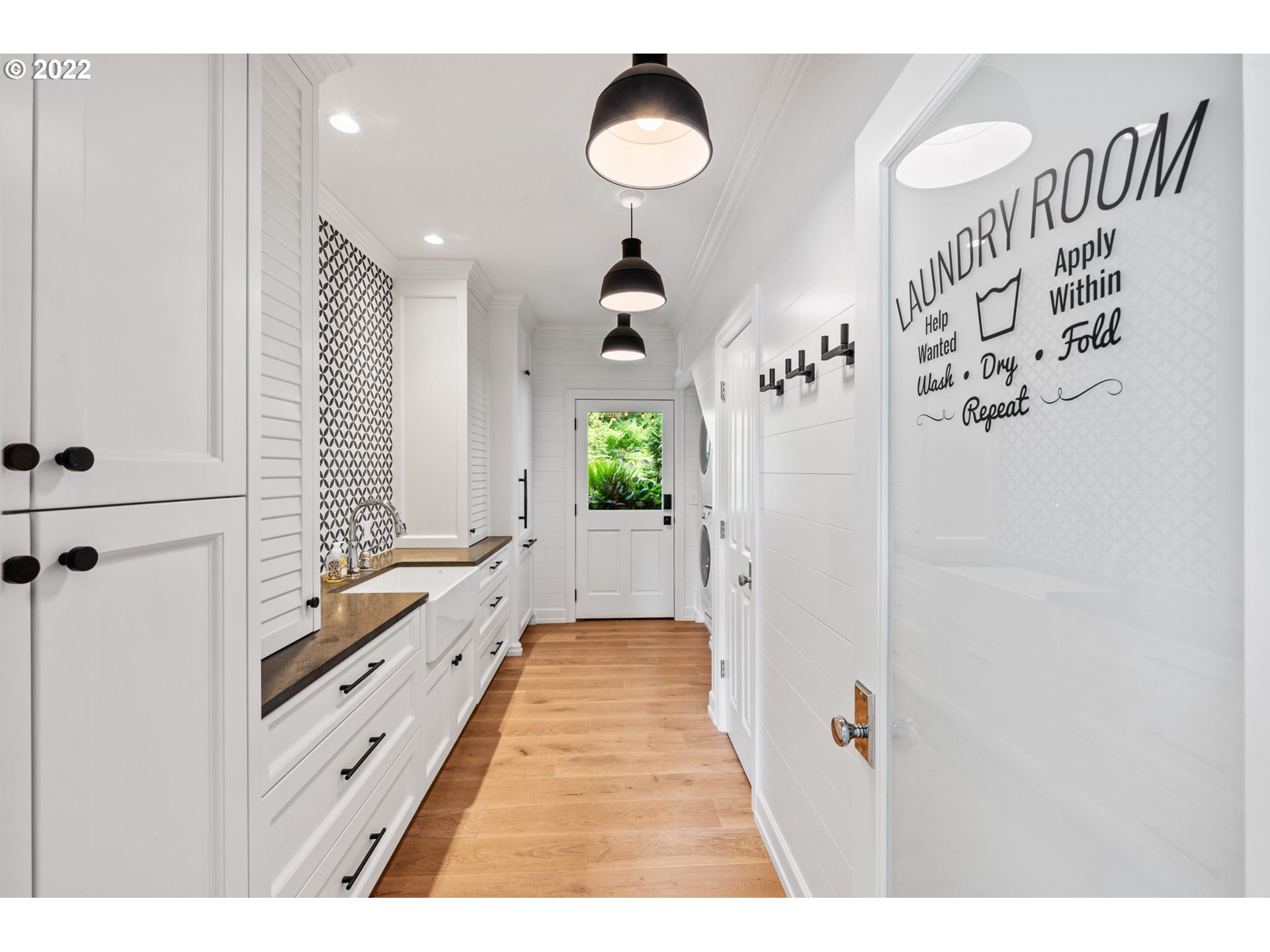 29195 Northeast Benjamin Road Newberg, OR 97132 - Photo 25 of 32 a bathroom with a double vanity sink and a mirror