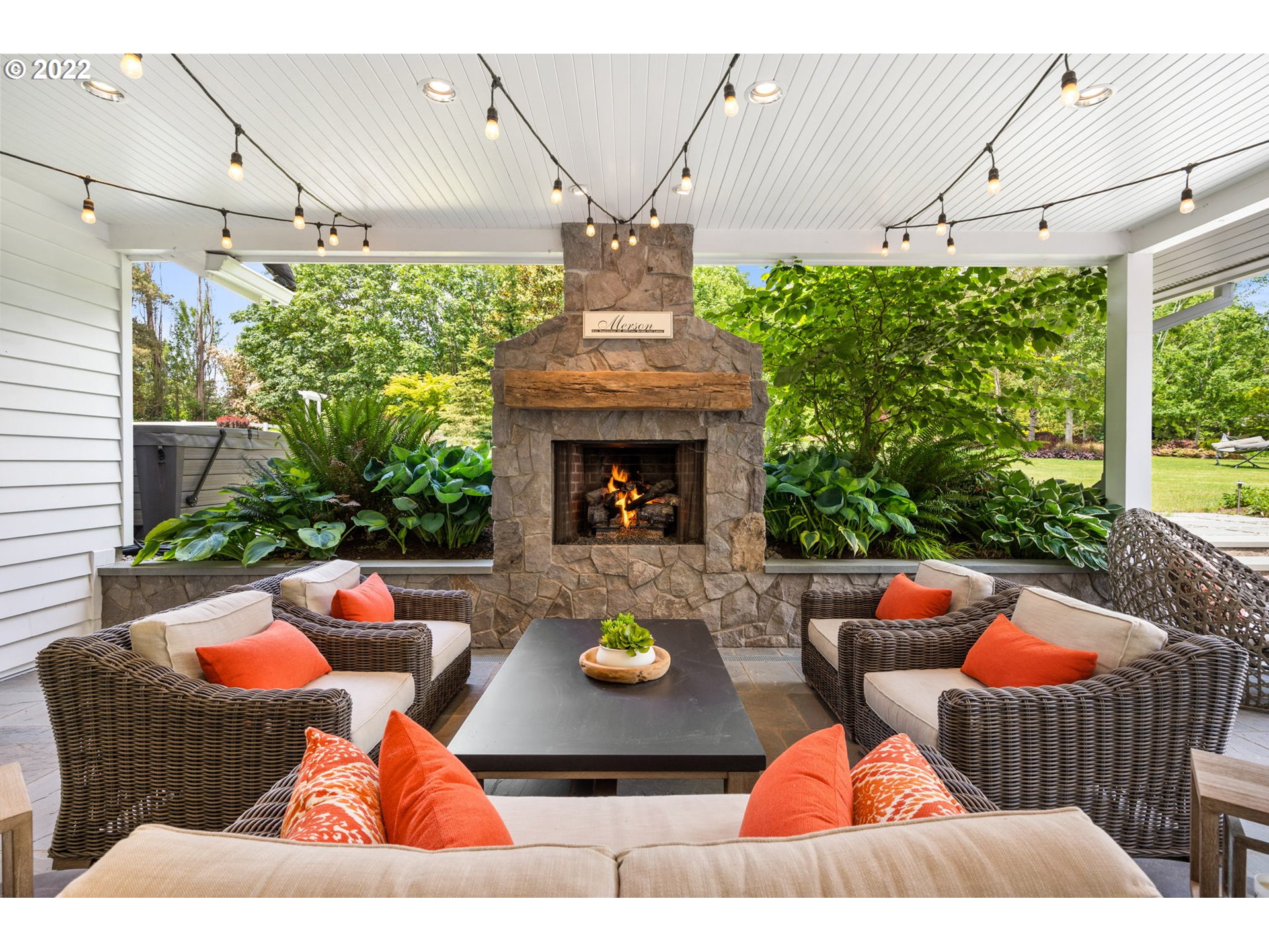 29195 Northeast Benjamin Road Newberg, OR 97132 - Photo 27 of 32 a outdoor space with chairs and a fireplace