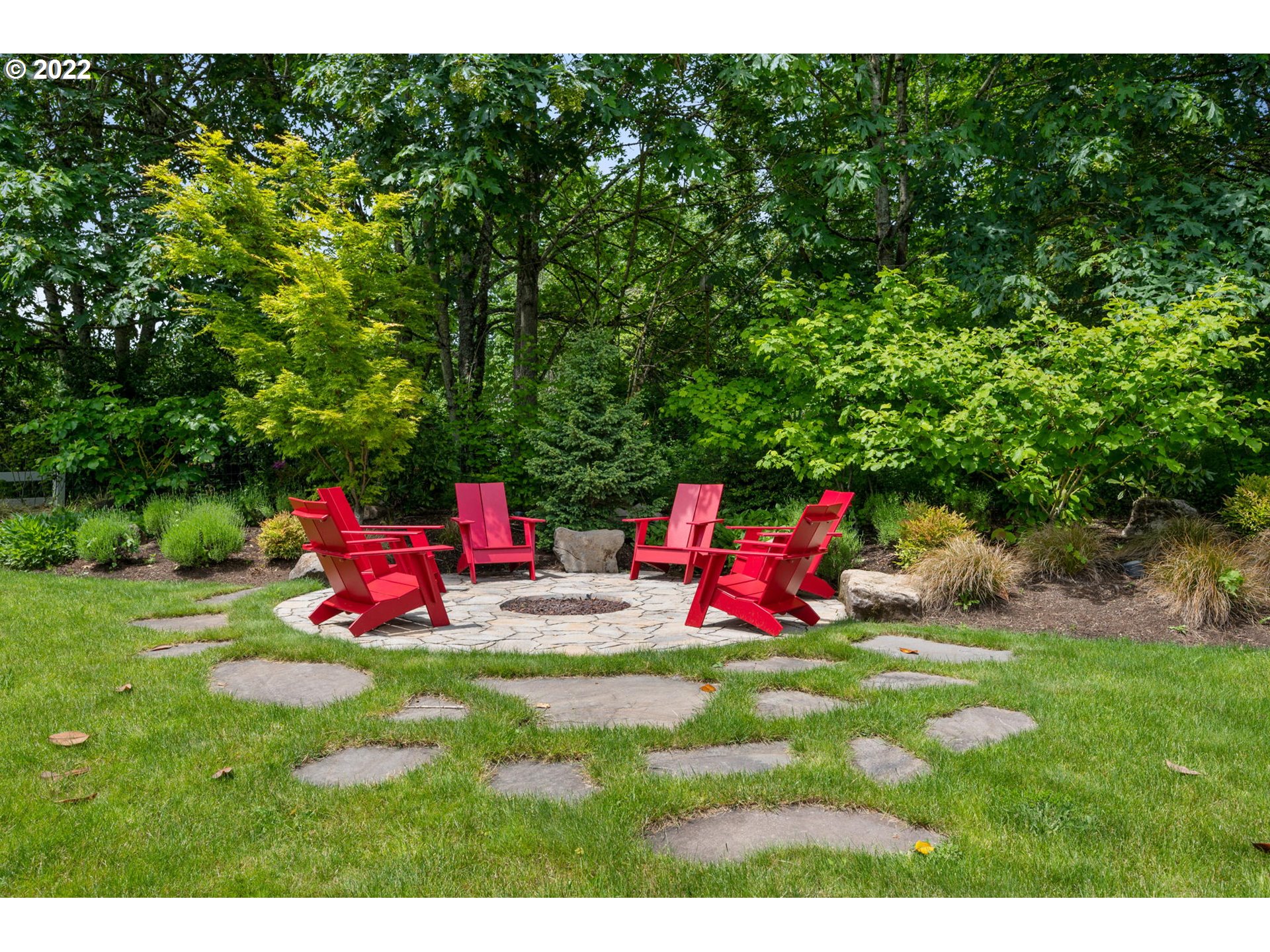 29195 Northeast Benjamin Road Newberg, OR 97132 - Photo 29 of 32 a view of a yard with furniture and garden