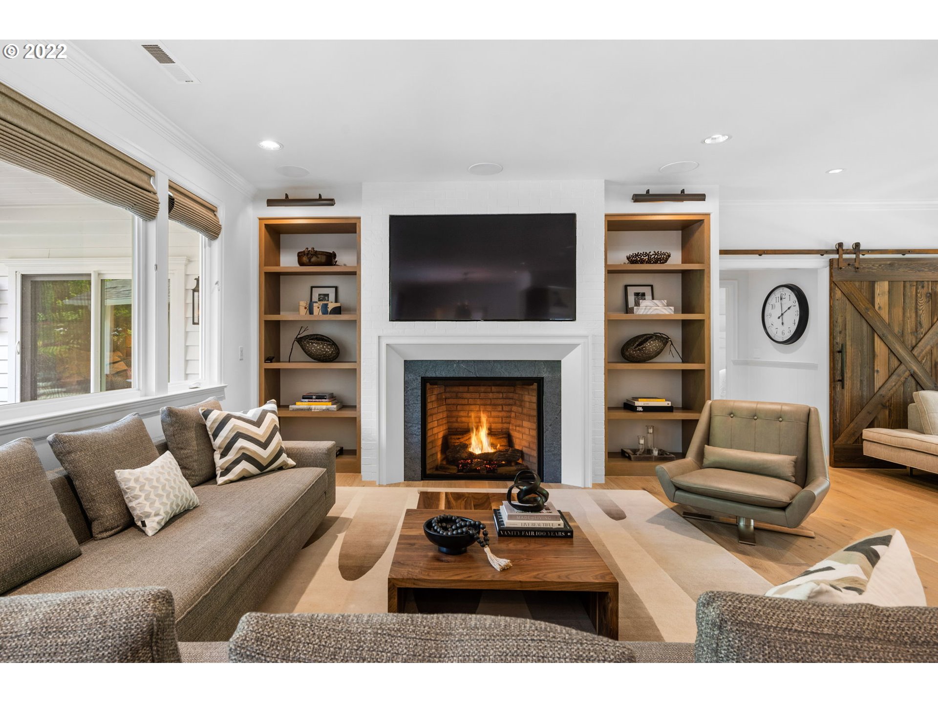 29195 Northeast Benjamin Road Newberg, OR 97132 - Photo 5 of 32 a living room with furniture and a fireplace