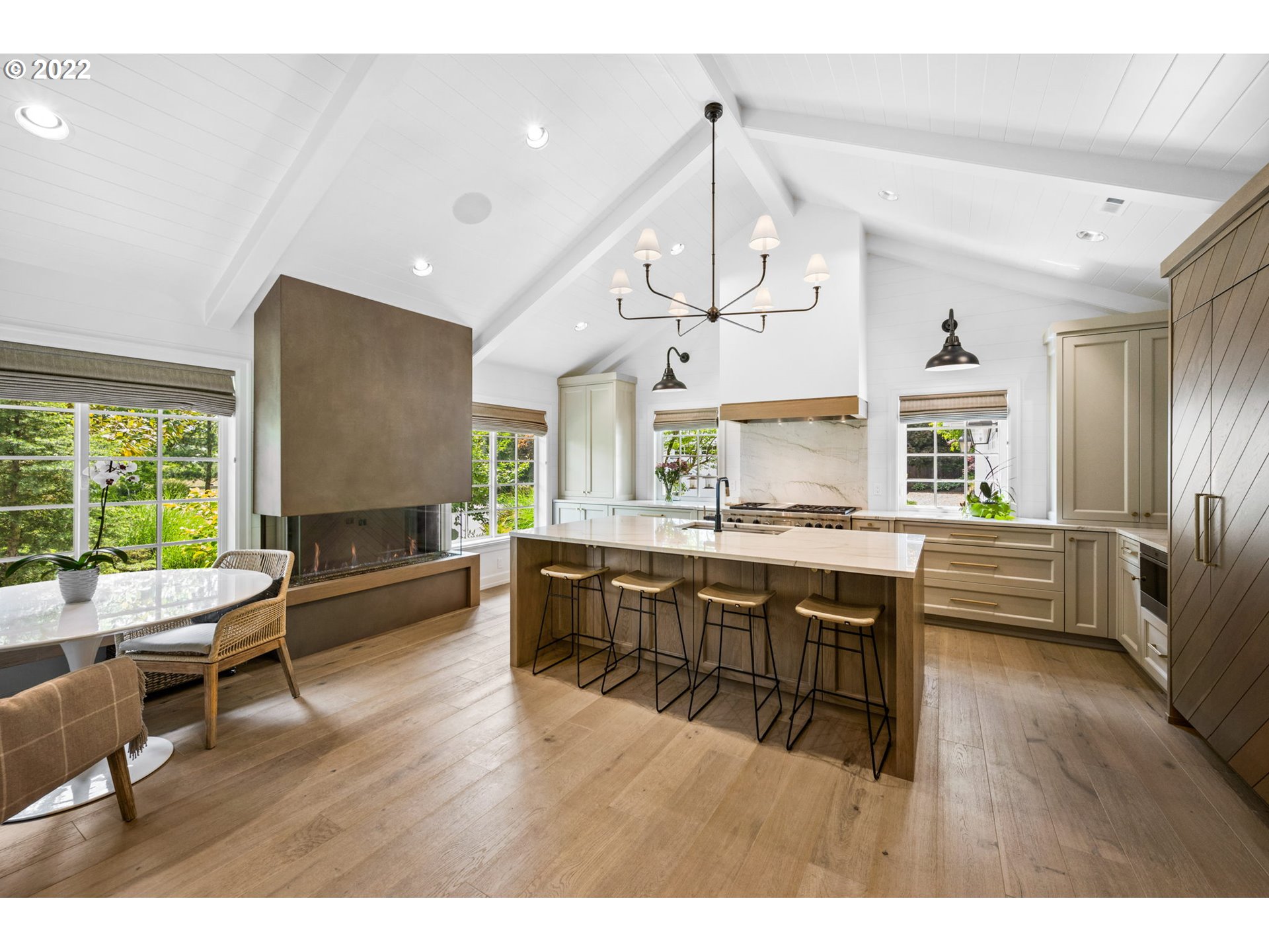 29195 Northeast Benjamin Road Newberg, OR 97132 - Photo 9 of 32 a view of a dining room with furniture window and wooden floor