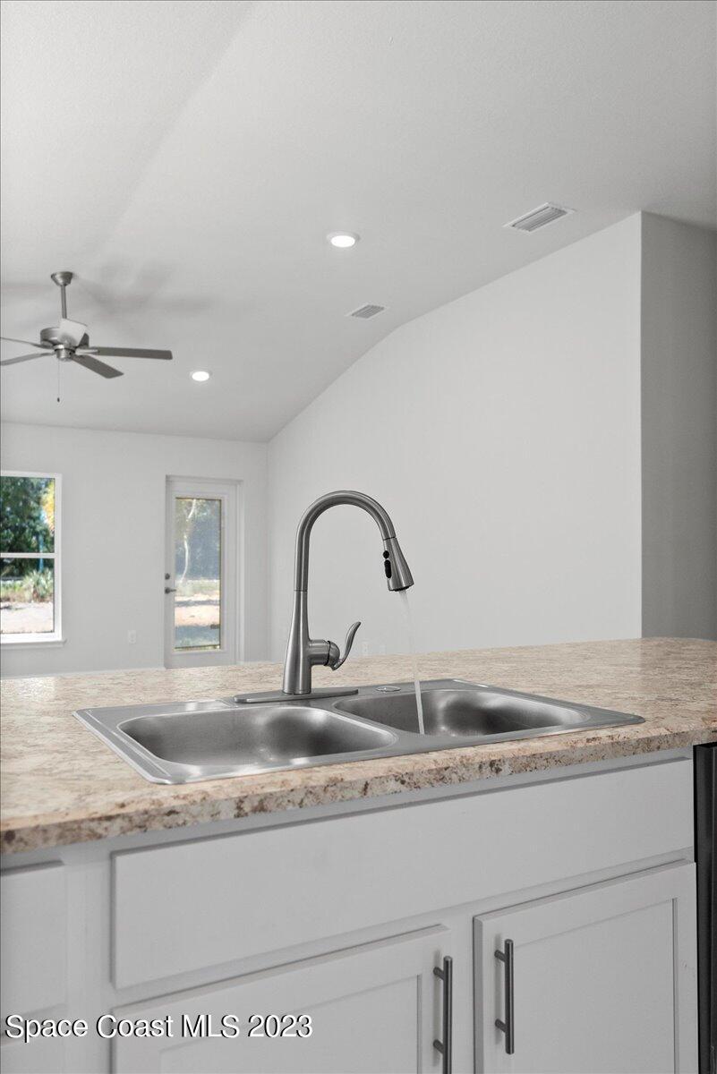 1341 Tupelo Circle Cocoa, FL 32926 - Photo 11 of 27 a close view of sink and tap