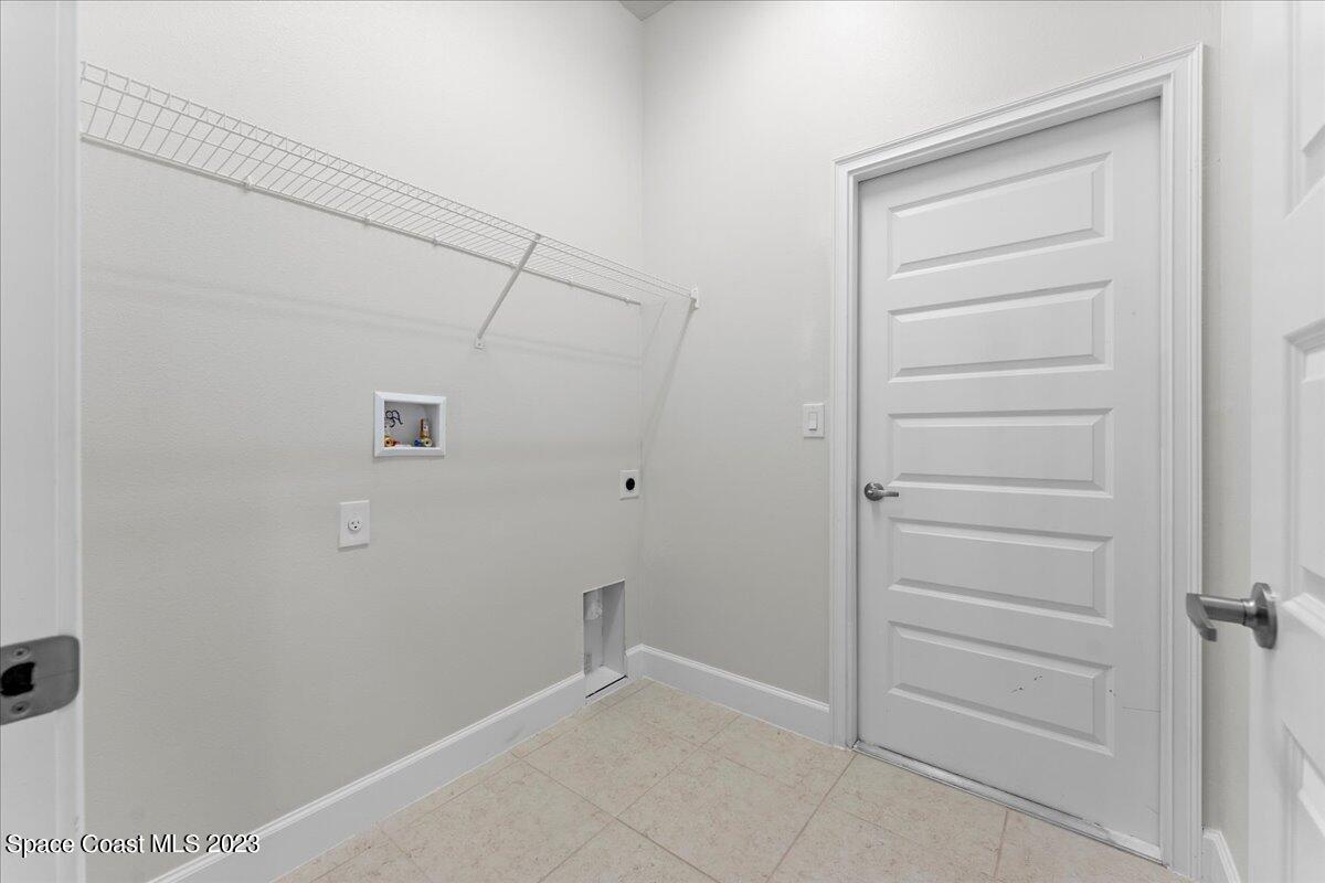 1341 Tupelo Circle Cocoa, FL 32926 - Photo 24 of 27 a view of an empty walk in closet
