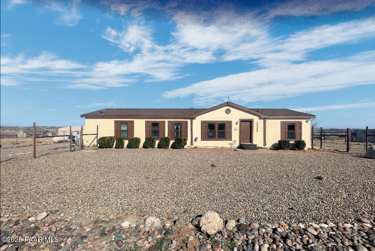 22355 North Docs Road Paulden, AZ 86334 - Photo 1 of 20 a front view of a house with a yard