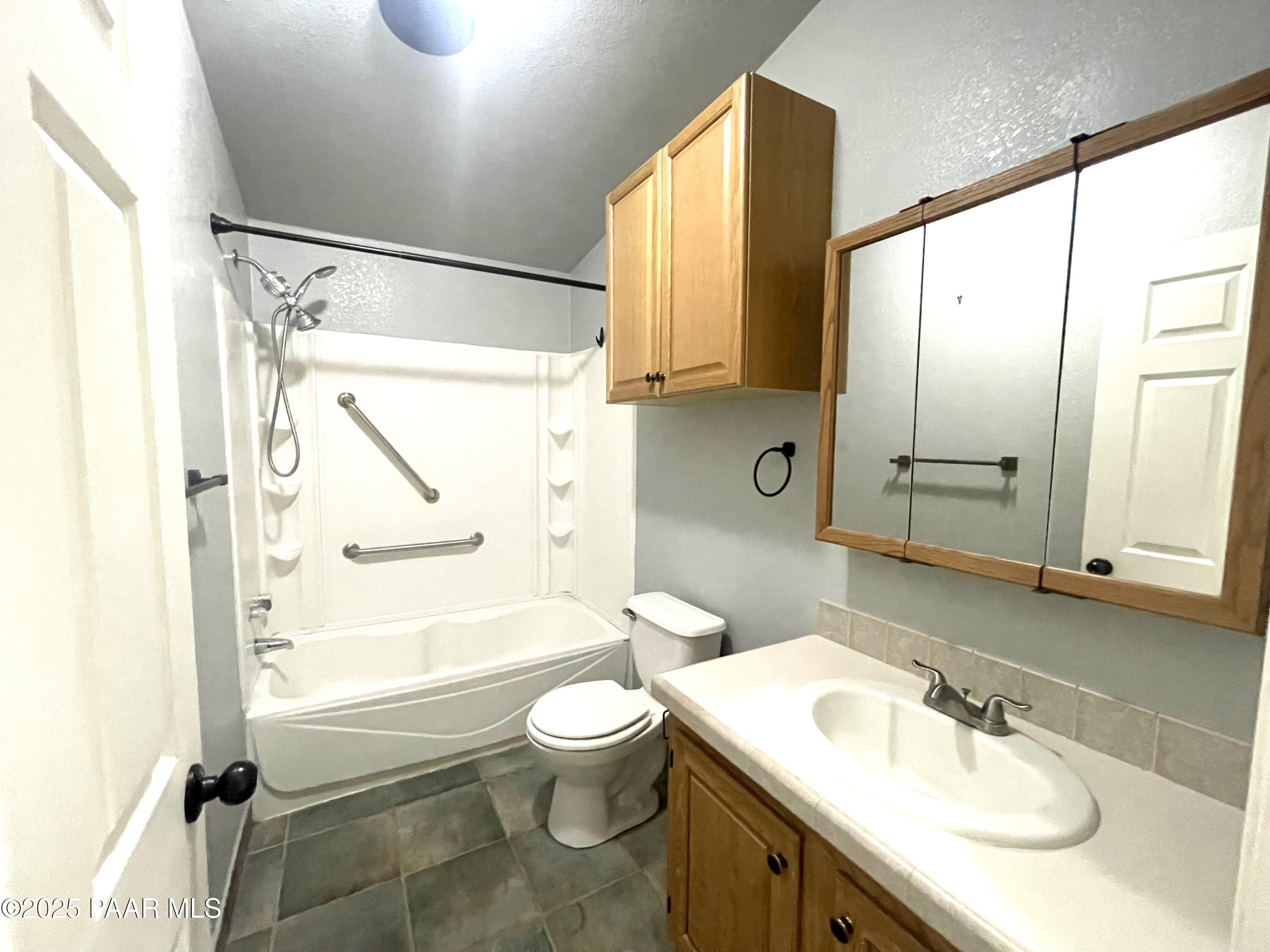 22355 North Docs Road Paulden, AZ 86334 - Photo 14 of 20 a bathroom with a sink toilet tub and shower