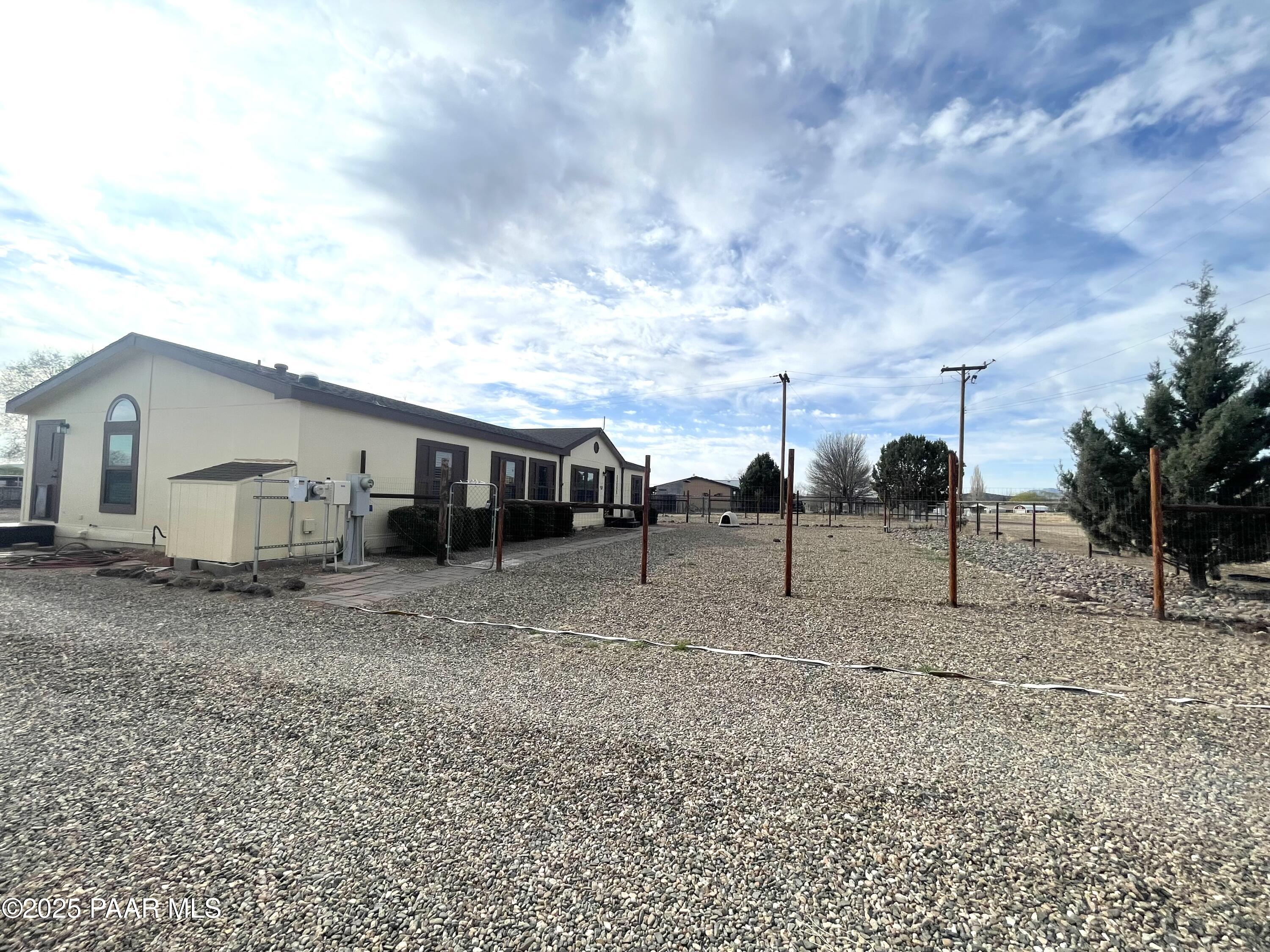 22355 North Docs Road Paulden, AZ 86334 - Photo 16 of 20 a view of a house with backyard