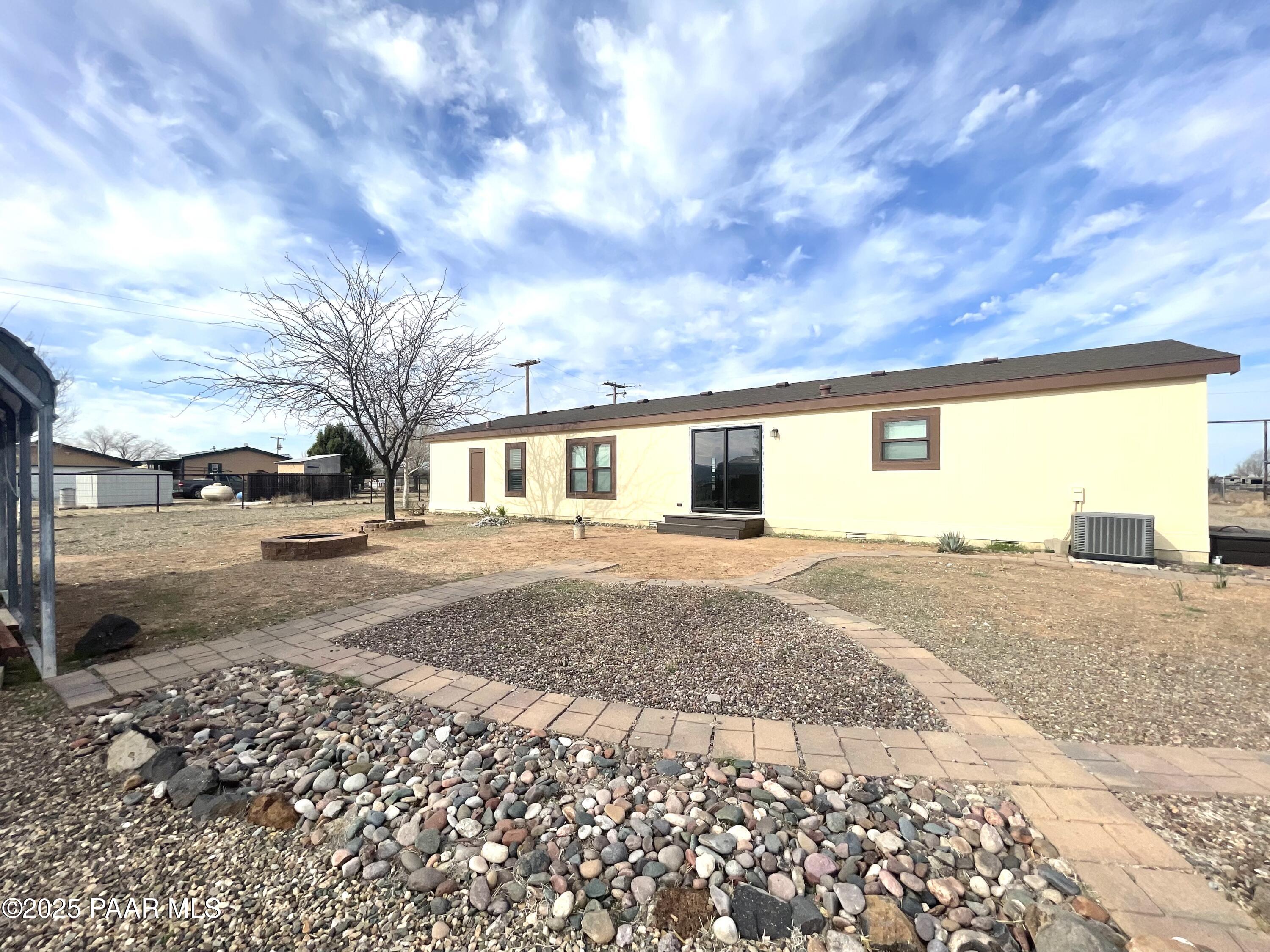 22355 North Docs Road Paulden, AZ 86334 - Photo 17 of 20 a view of a house with a yard