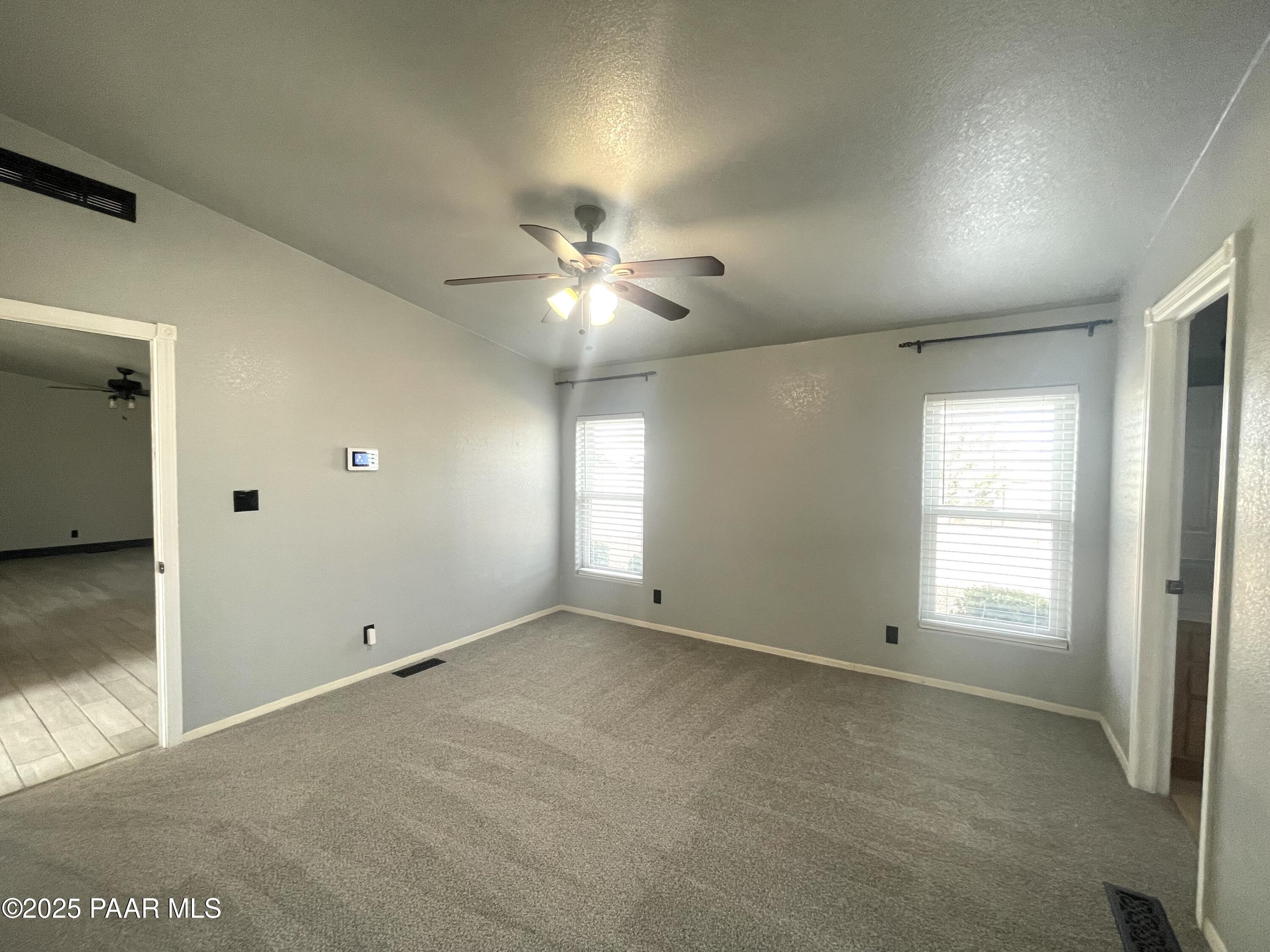 22355 North Docs Road Paulden, AZ 86334 - Photo 8 of 20 a view of an empty room with a window