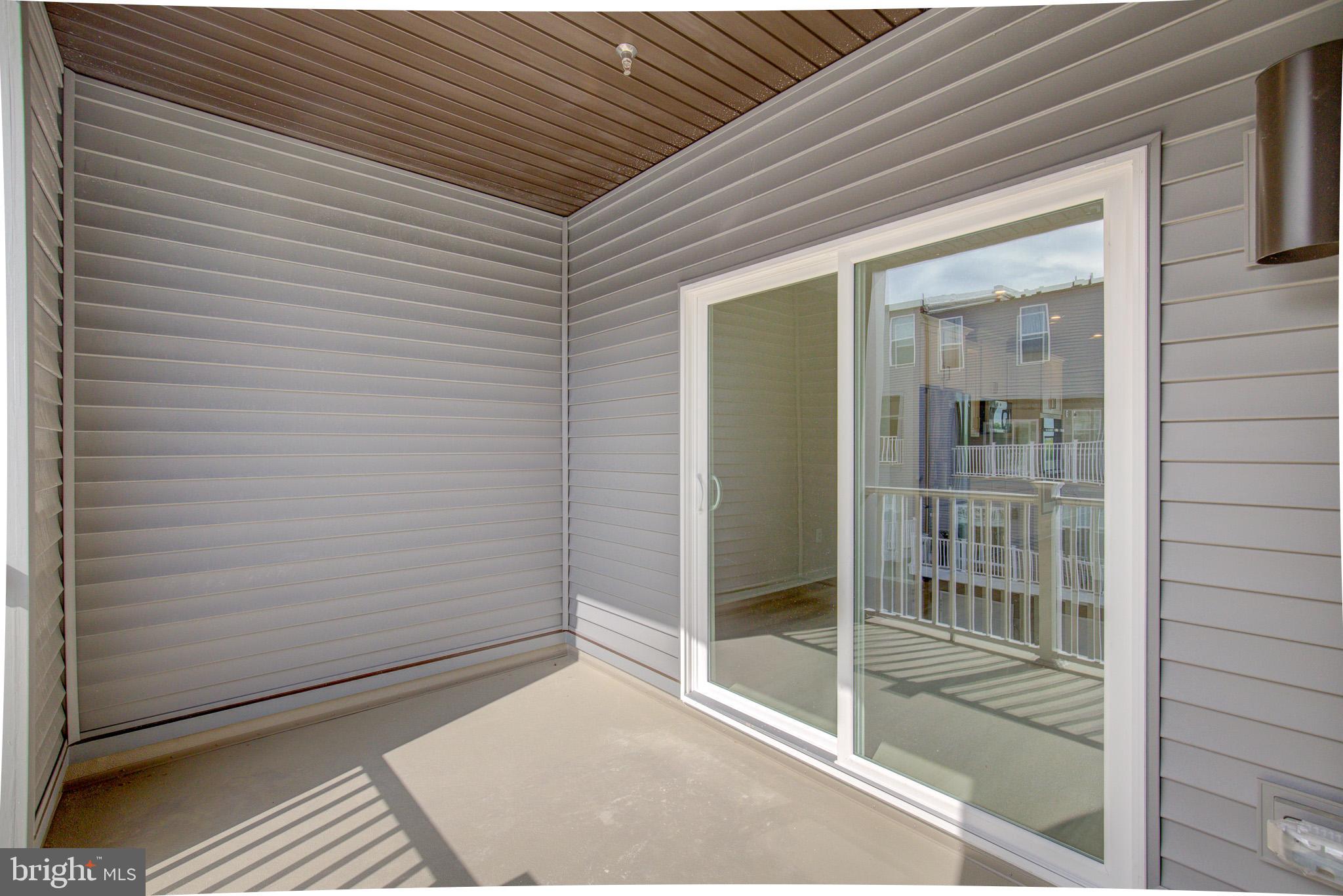 14138 Gypsum Loop Chantilly, VA 20151 - Photo 18 of 36 Covered Deck off of Kitchen