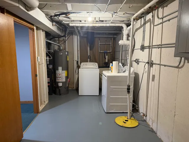 a view of storage and utility room with a sink
