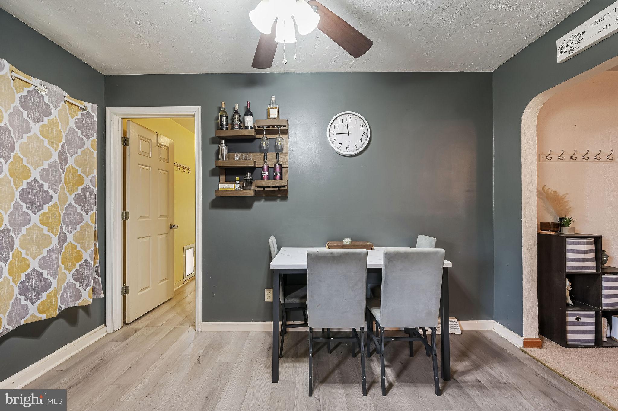 87 Wayne Drive Dover, DE 19901 - Photo 18 of 20 a view of a dining room with furniture and wooden floor
