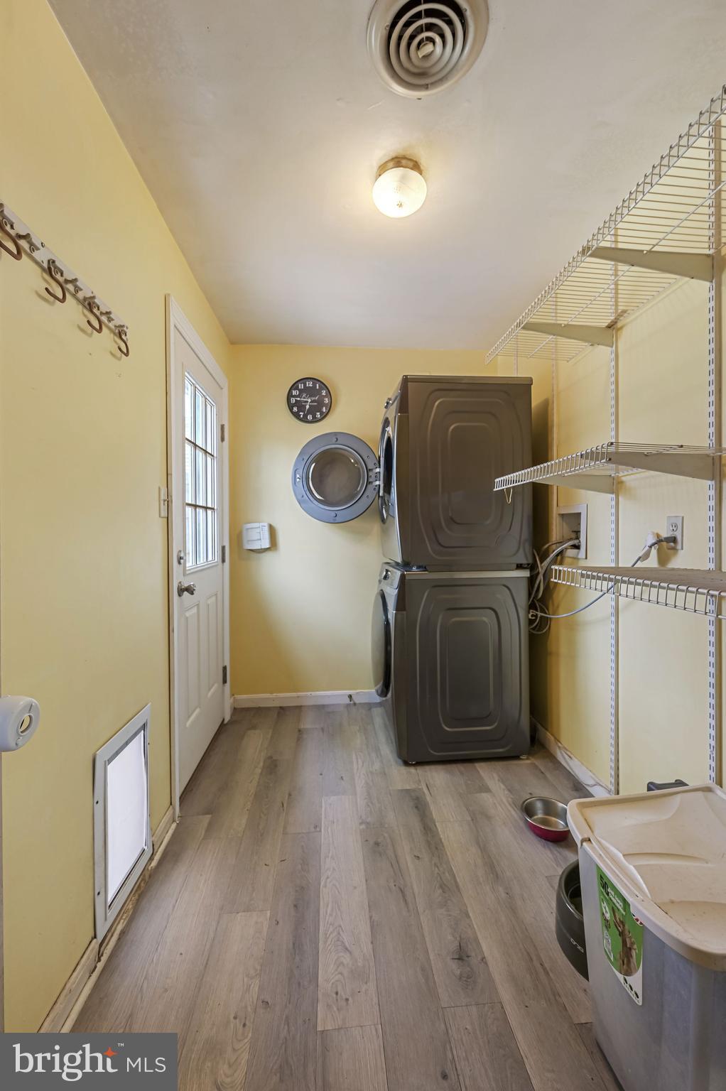87 Wayne Drive Dover, DE 19901 - Photo 20 of 20 a storage room with washer and dryer