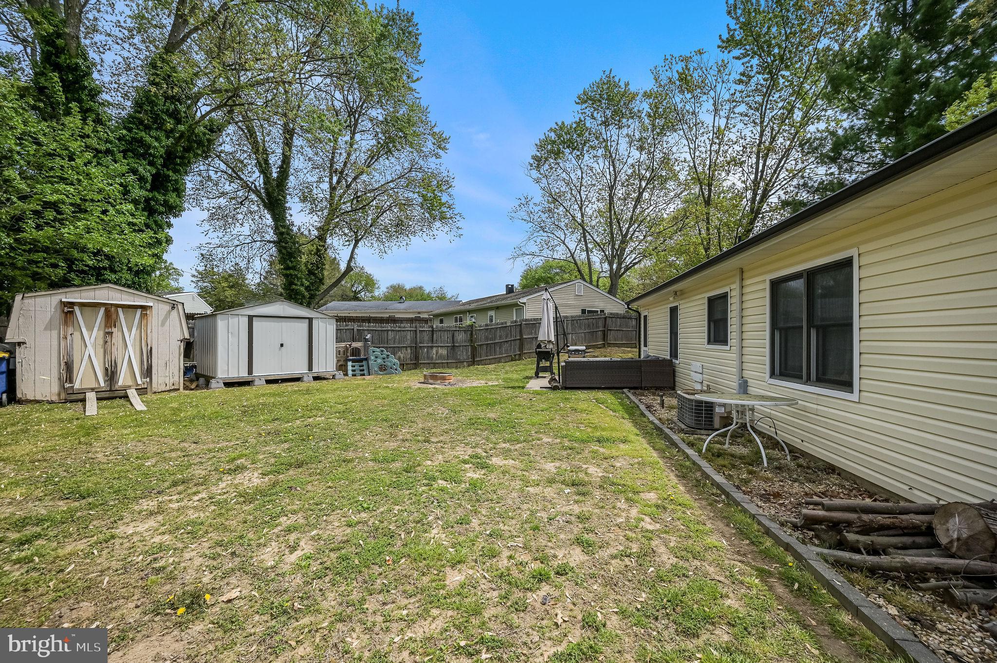 87 Wayne Drive Dover, DE 19901 - Photo 4 of 20 a front view of a house with a yard