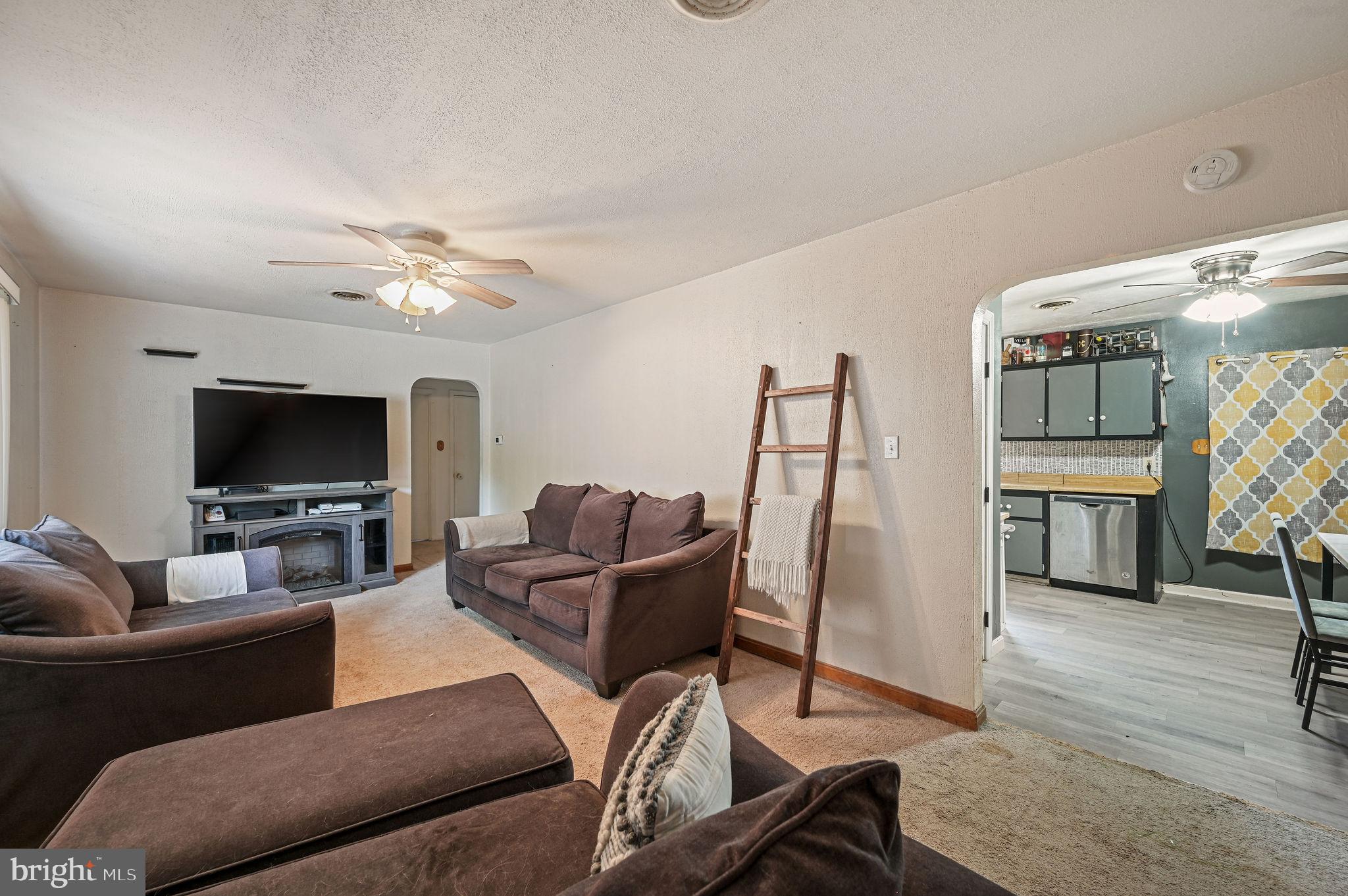 87 Wayne Drive Dover, DE 19901 - Photo 6 of 20 a living room with furniture and a flat screen tv