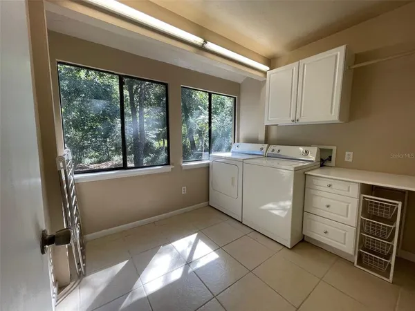 a kitchen with a stove and a sink
