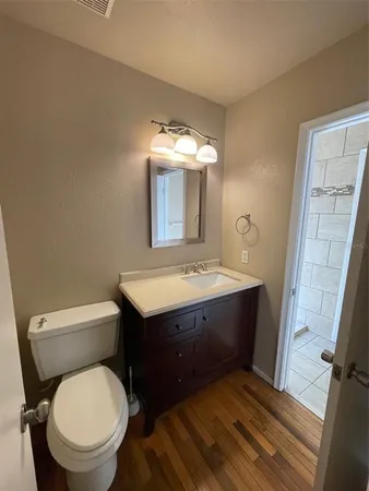 a bathroom with a sink and a toilet