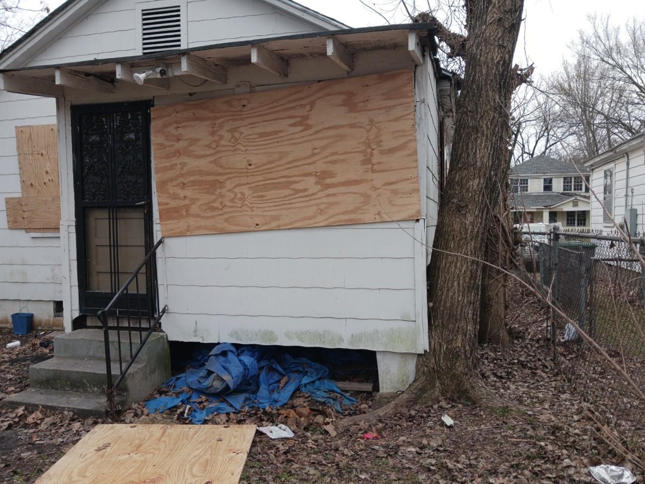 2178 Eldridge Avenue Memphis, TN 38108 - Photo 2 of 12 a front view of a house with a yard