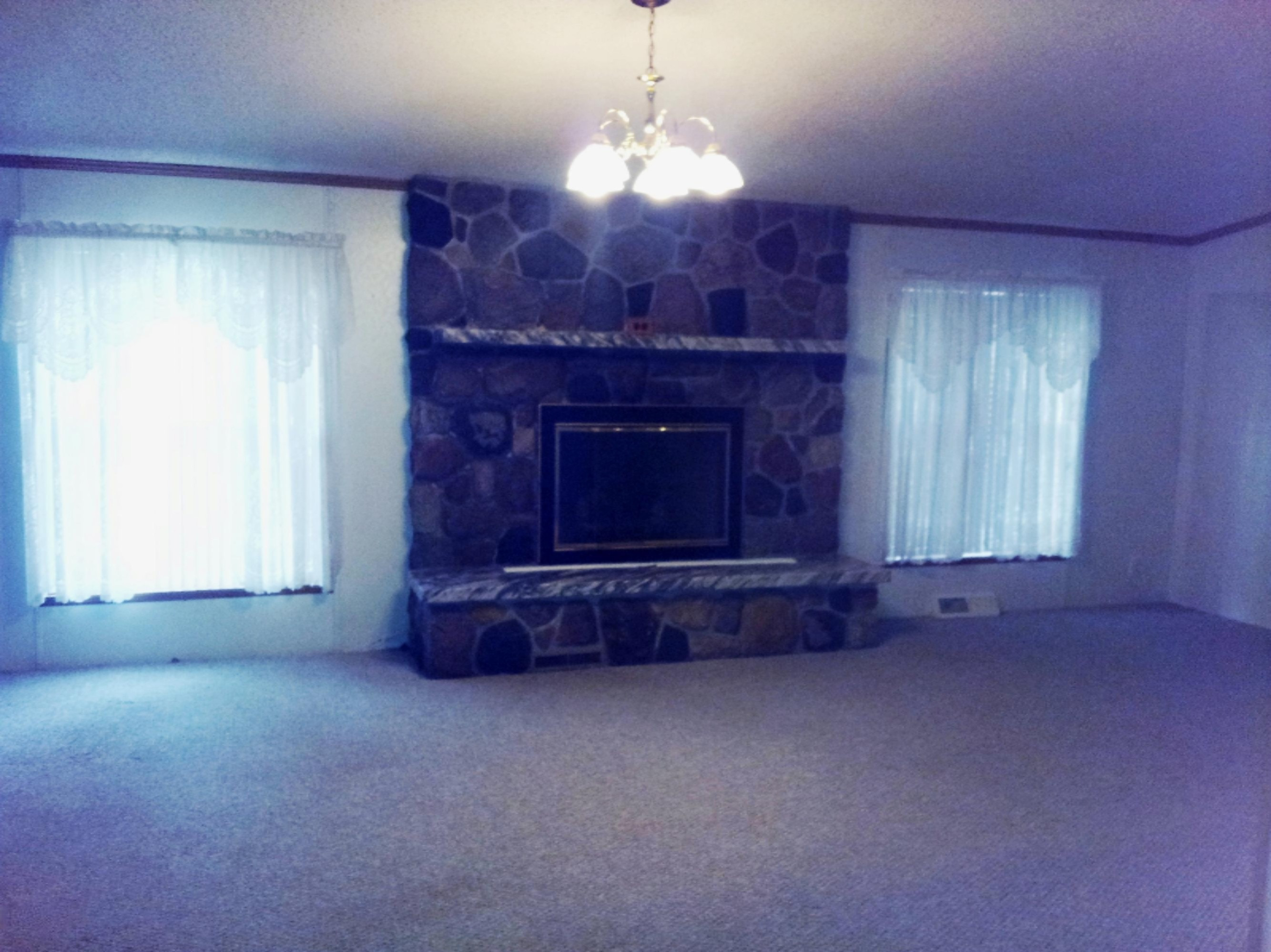 4950 Carlson Road Stanton, MI 48888 - Photo 8 of 18 Fireplace in front livingroom