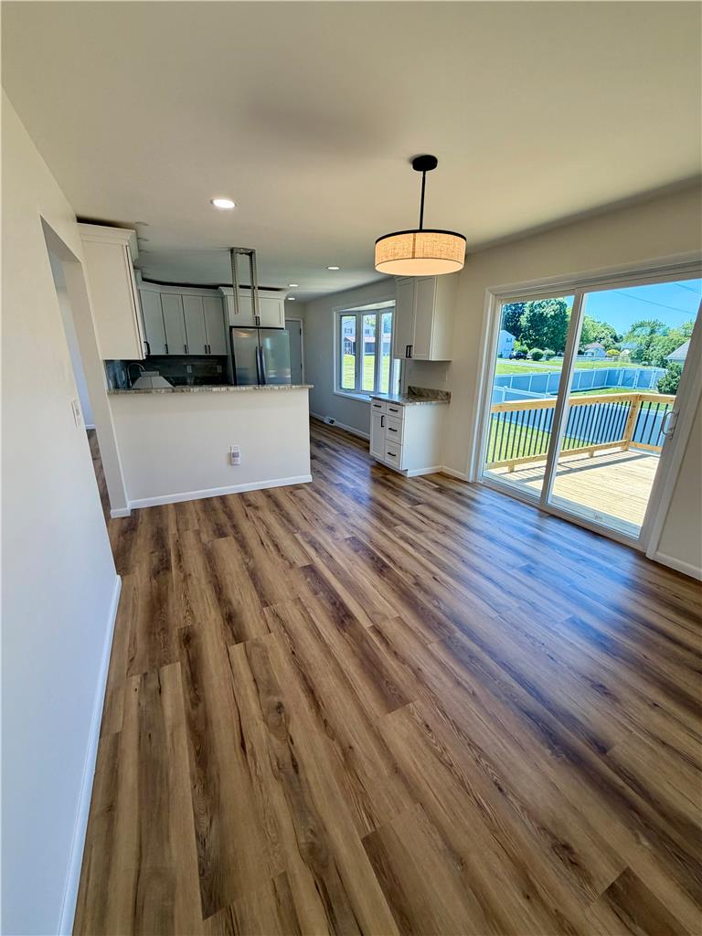 3508 Nazareth Road Easton, PA 18045 - Photo 13 of 25 An open concept design, this space features sleek flooring, a modern kitchen, and an inviting outdoor deck.