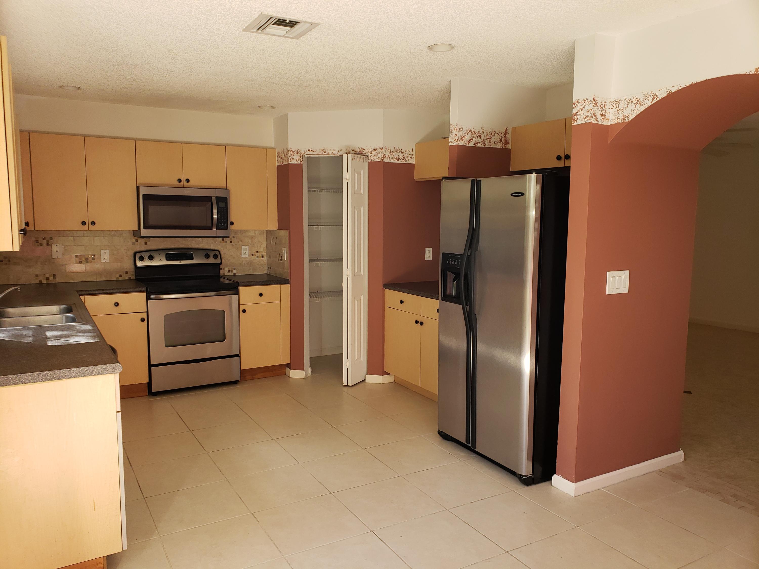 1119 Imperial Lake Road West Palm Beach, FL 33413 - Photo 7 of 19 Kitchen.