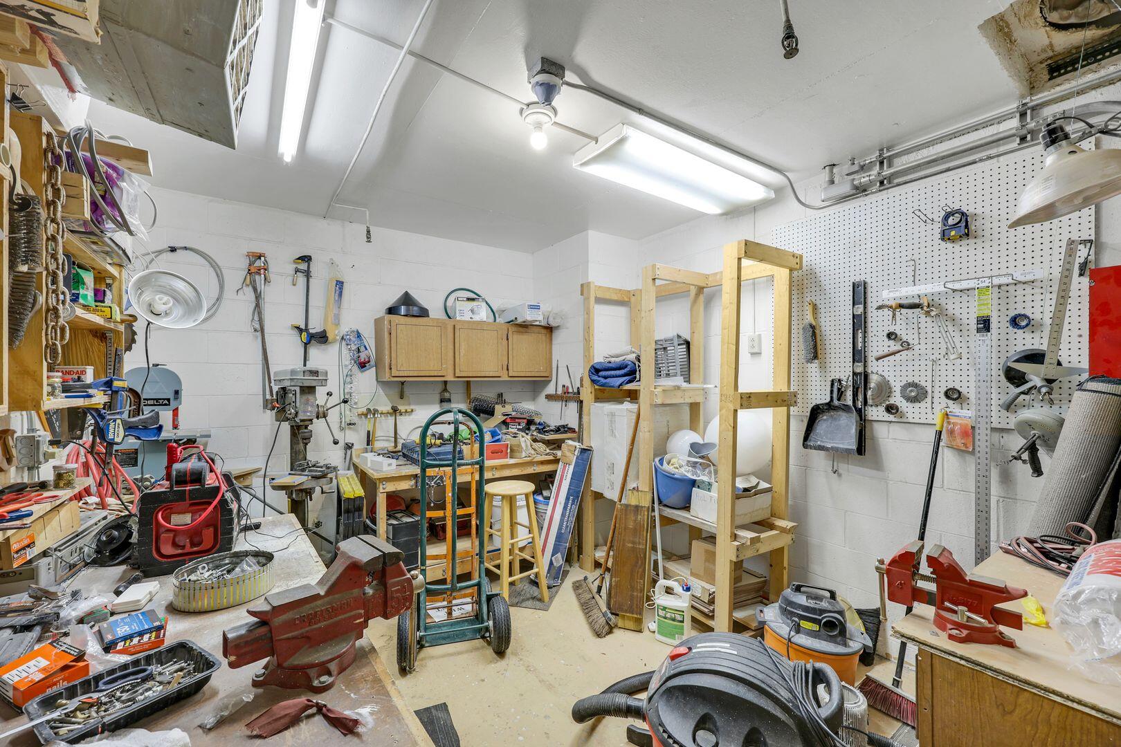 60 West Pelican Street, Unit 407 Naples, FL 34113 - Photo 18 of 26 a view of a room with gym equipment