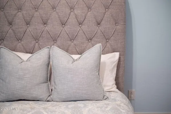 a bathroom with a sink toilet and mirror