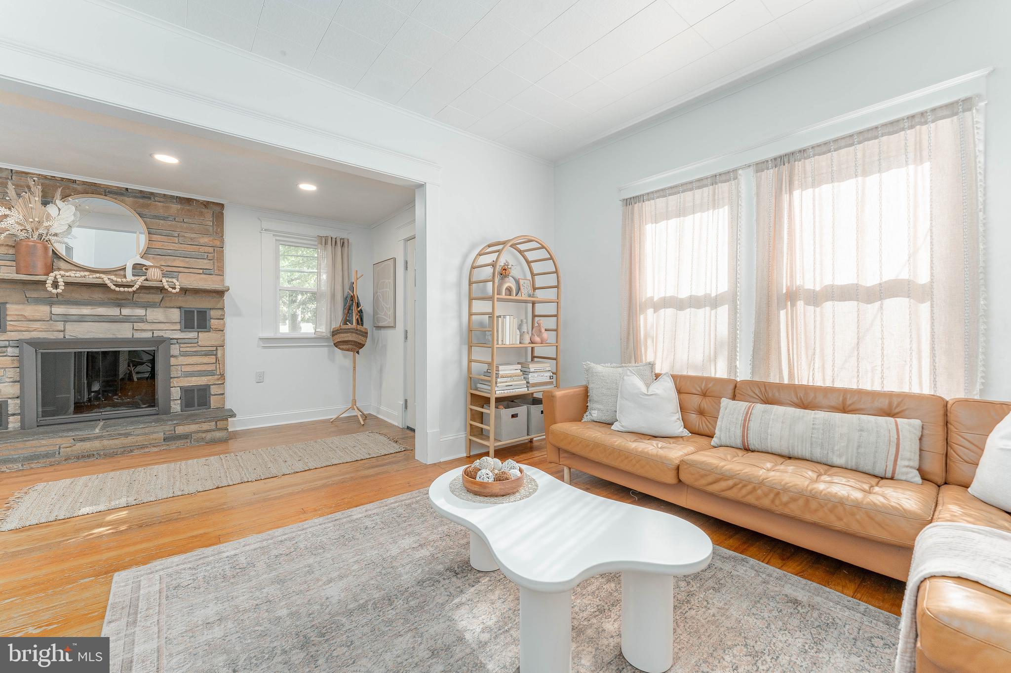 864 North Avenue Springfield, PA 19064 - Photo 11 of 33 a living room with furniture and a fireplace