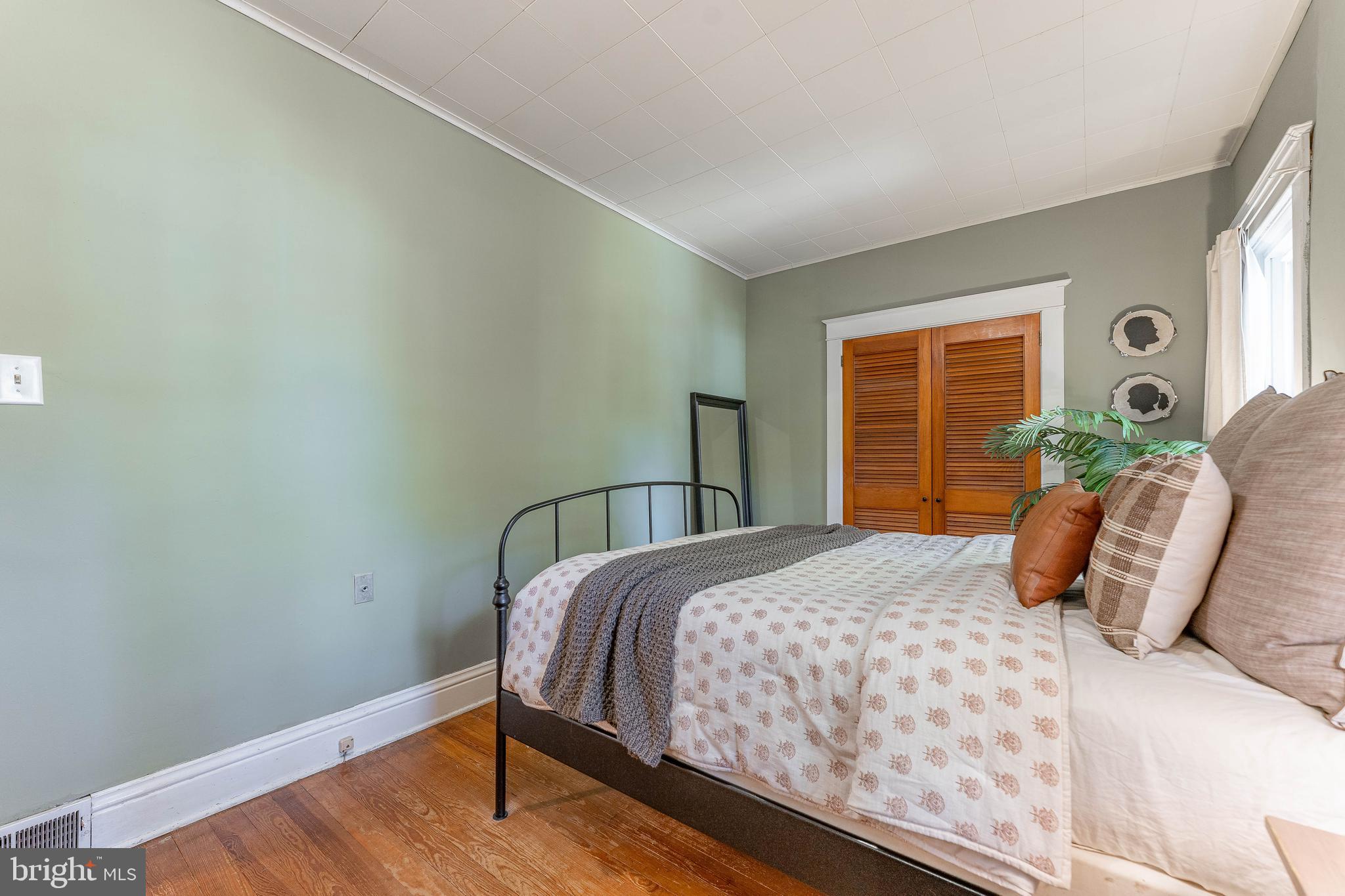 864 North Avenue Springfield, PA 19064 - Photo 26 of 33 a bedroom with a bed and window