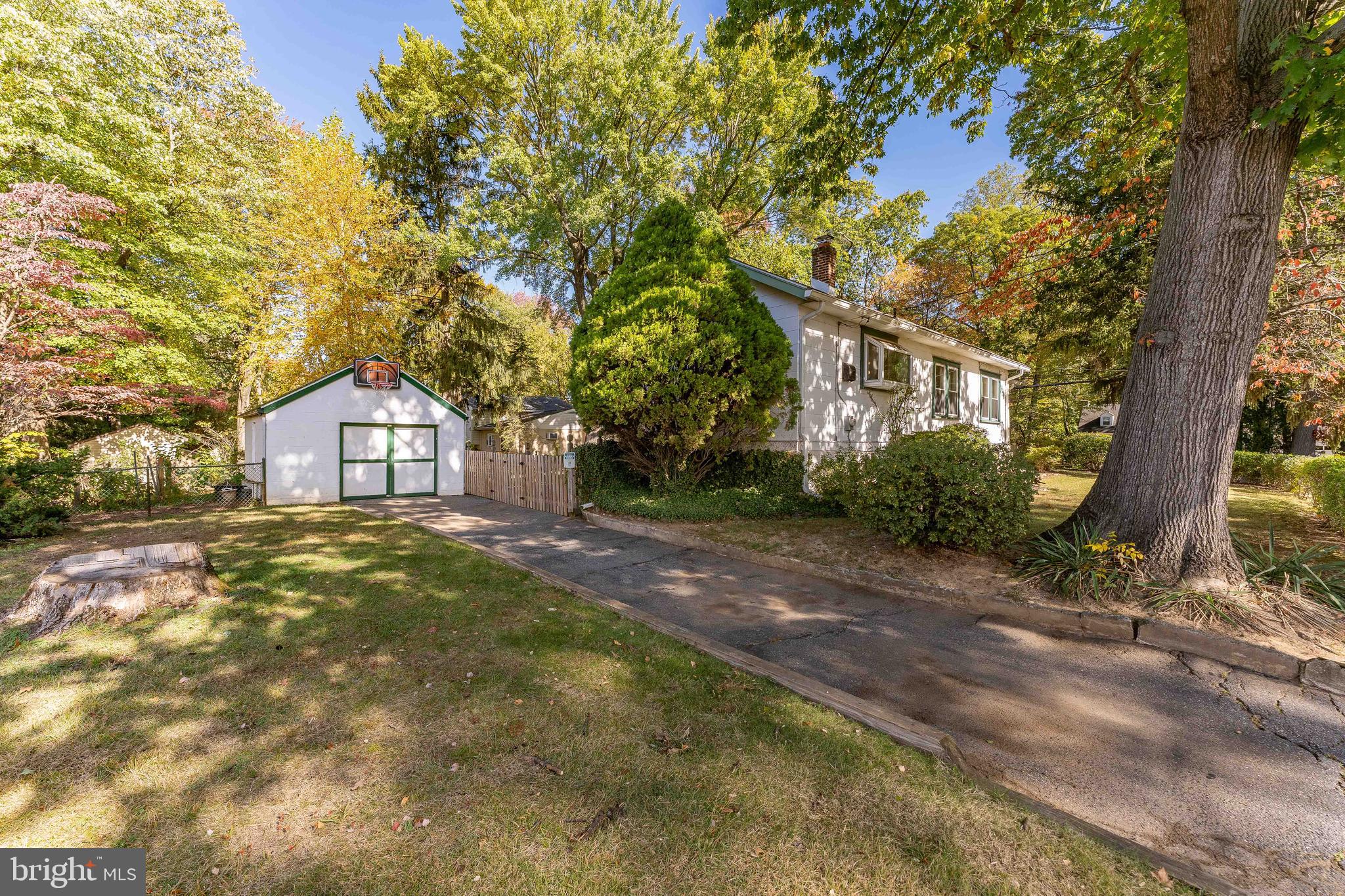 864 North Avenue Springfield, PA 19064 - Photo 3 of 33 a view of a house with yard and tree s