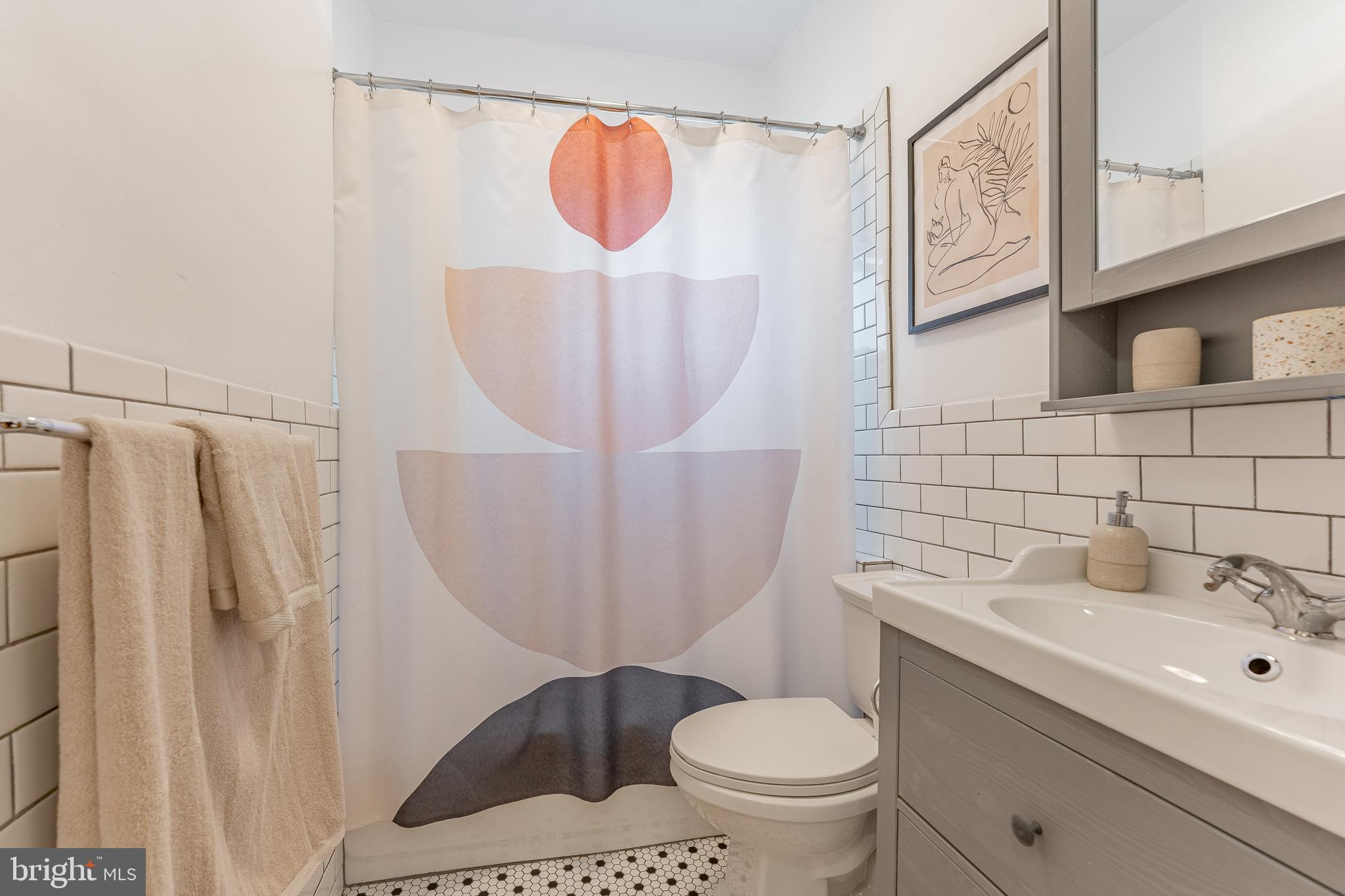 864 North Avenue Springfield, PA 19064 - Photo 31 of 33 a bathroom with a sink toilet and shower