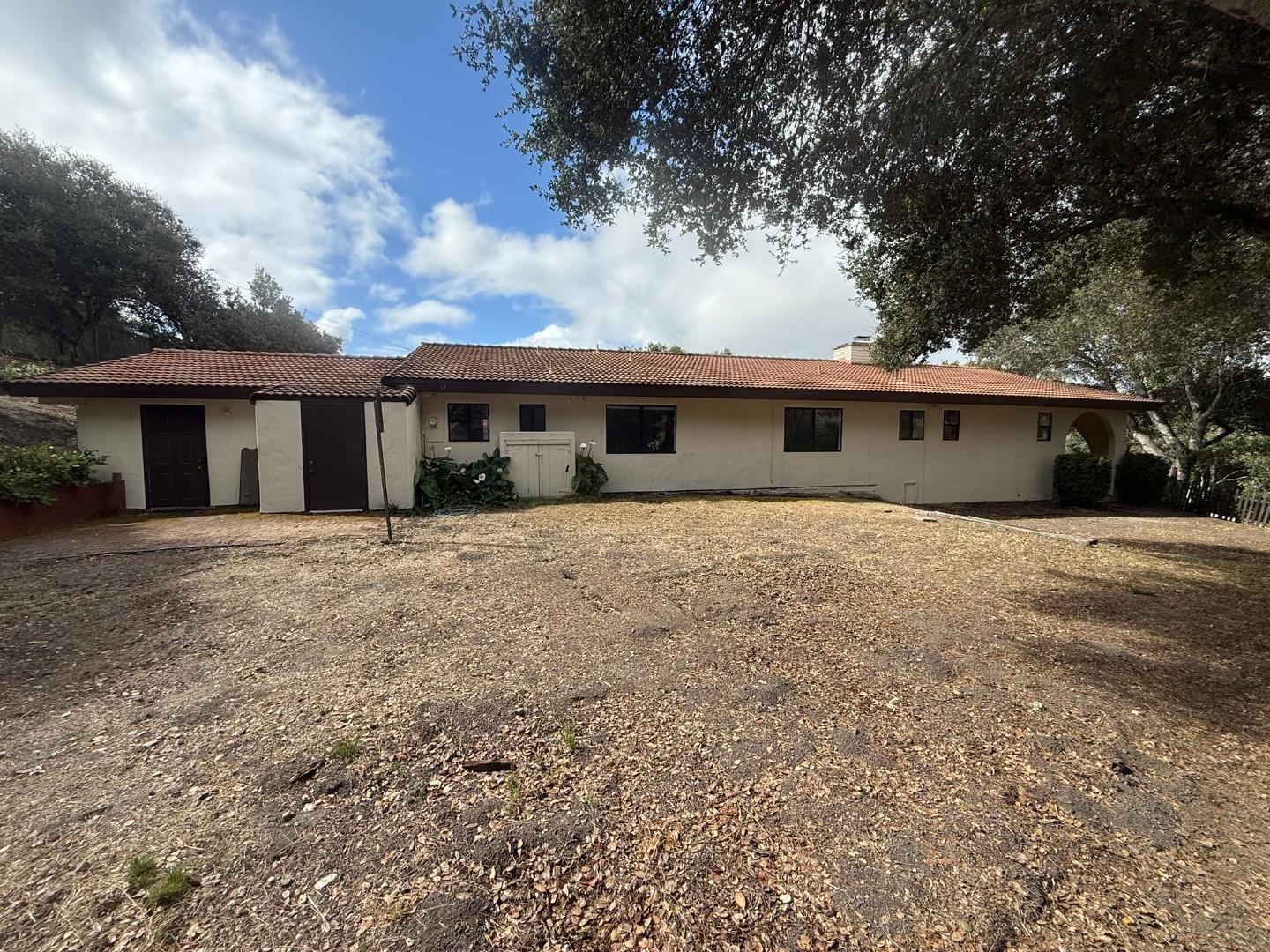 11585 McCarthy Road Carmel Valley, CA 93924 - Photo 16 of 52 front view of house with a yard