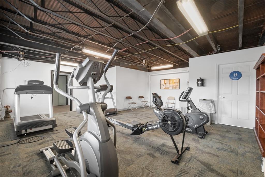 128 North Craig Street, Unit 814 Pittsburgh, PA 15213 - Photo 26 of 34 a view of a room with gym equipment