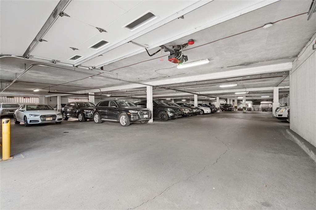 128 North Craig Street, Unit 814 Pittsburgh, PA 15213 - Photo 28 of 34 a view of parking garage with cars