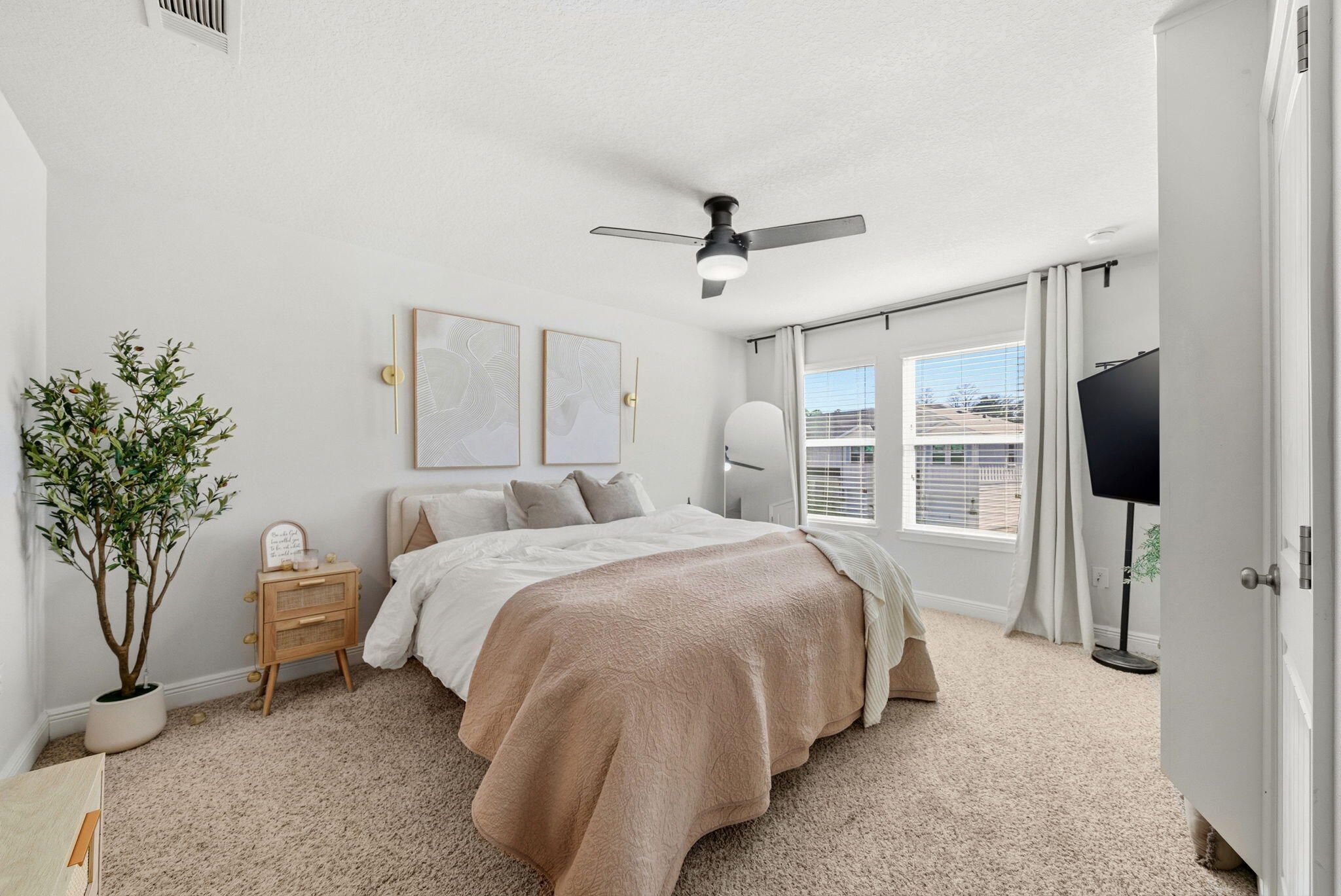 25 Crossing Lane, Unit C Santa Rosa Beach, FL 32459 - Photo 14 of 37 a bed room with a bed and a television