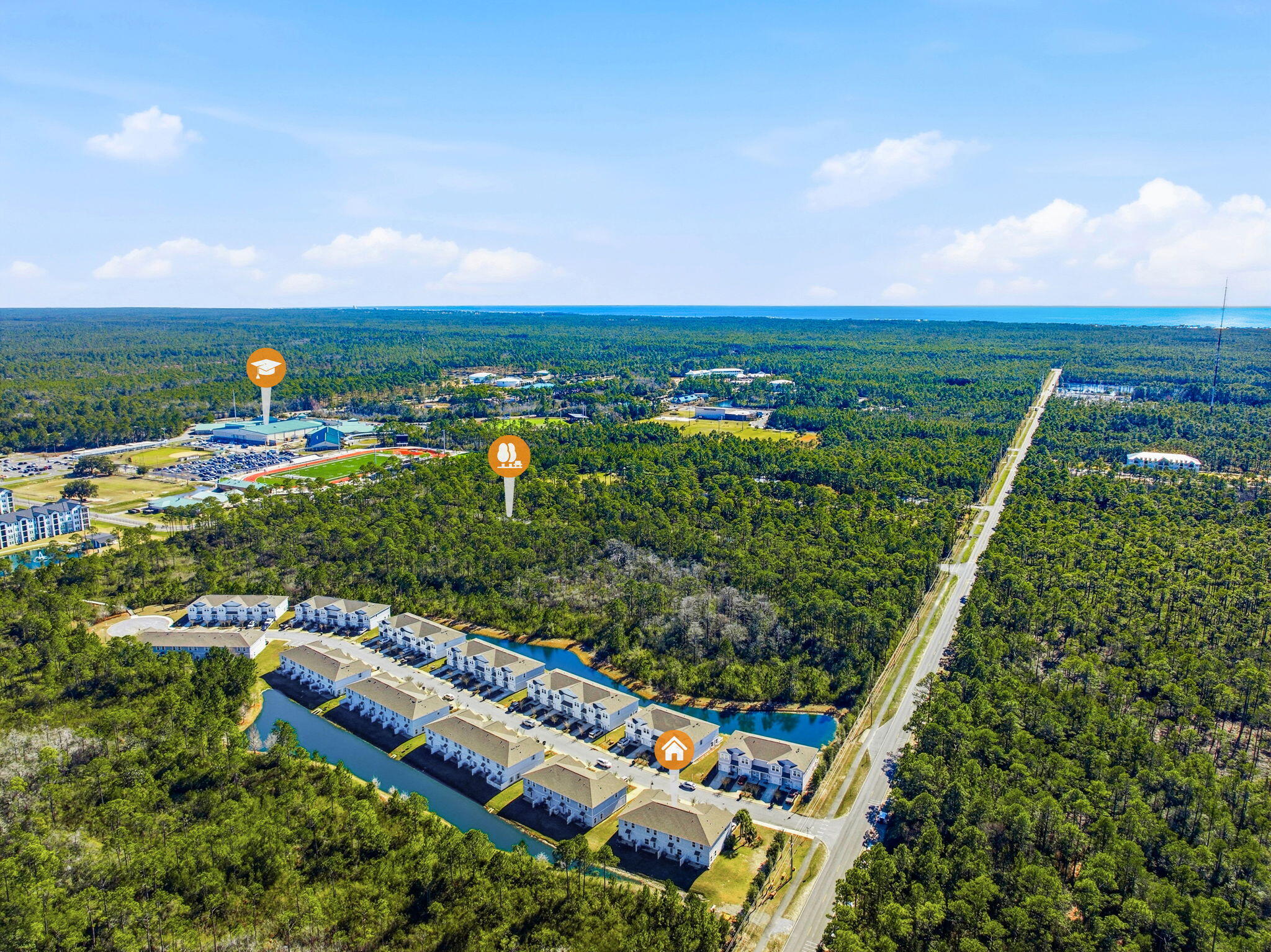 25 Crossing Lane, Unit C Santa Rosa Beach, FL 32459 - Photo 34 of 37 an aerial view of a golf course with chairs