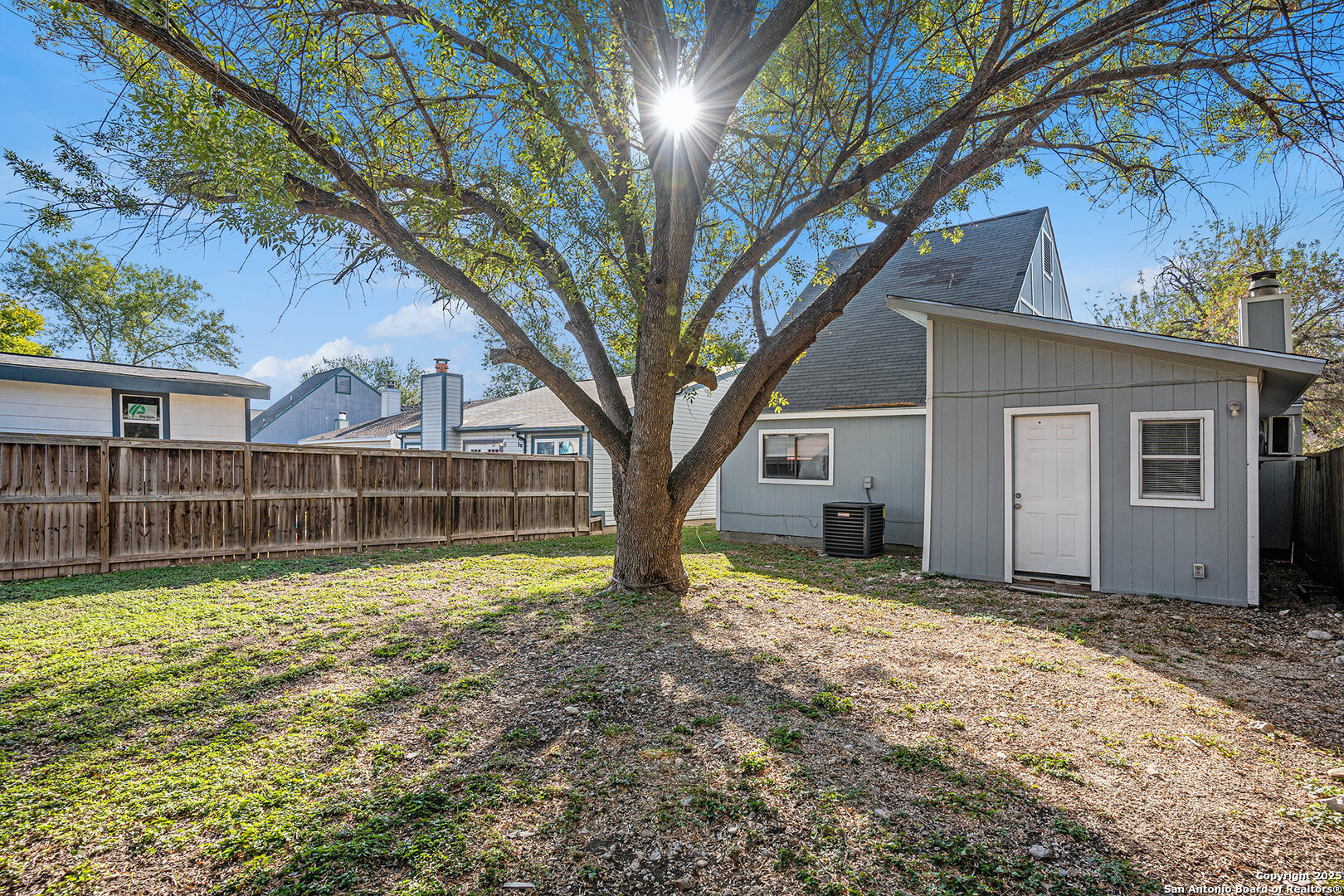 10023 Amber Field Drive San Antonio, TX 78245 - Photo 26 of 28 a view of a house with a yard