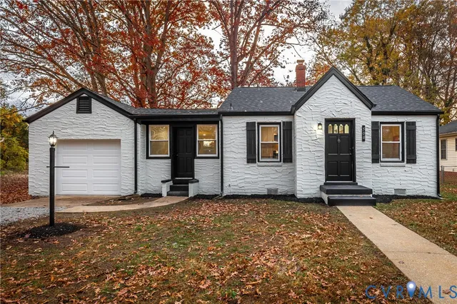 front view of a house with a small yard