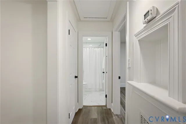 a bathroom with a bathtub and shower