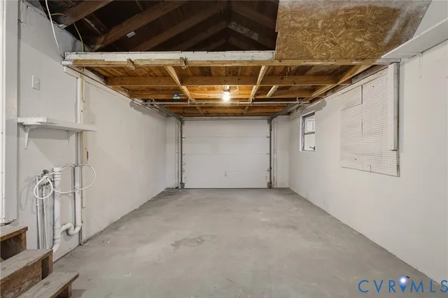 a view of a room with wooden walls