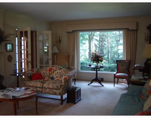 100 Hawthorne Road Fox Chapel, PA 15238 - Photo 7 of 15 Living Room. The living room has not only a beautiful fireplace, but also French doors and a beautiful window.