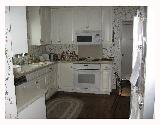 100 Hawthorne Road Fox Chapel, PA 15238 - Photo 10 of 15 Kitchen. Adjacent to the kitchen is a wonderful pantry, staircase to the second floor, and doors to the garage and patio.