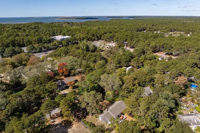 an aerial view of residential house with outdoor space
