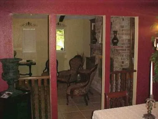 a bathroom with a bathtub and a sink