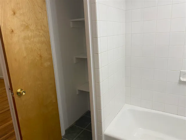 a bathroom with a bathtub