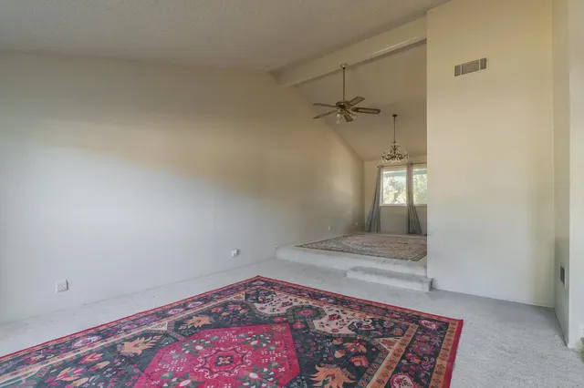 an entryway with a rug