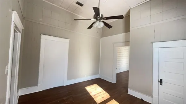 a view of an empty room and window