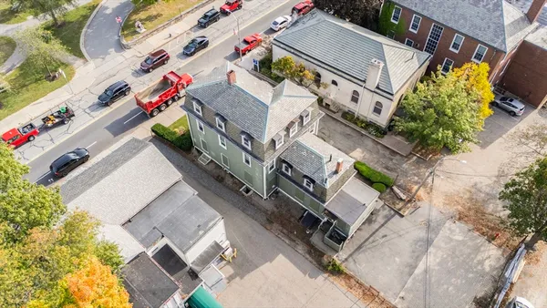 an aerial view of a house with a garden