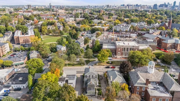 an aerial view of a city with lots of residential buildings